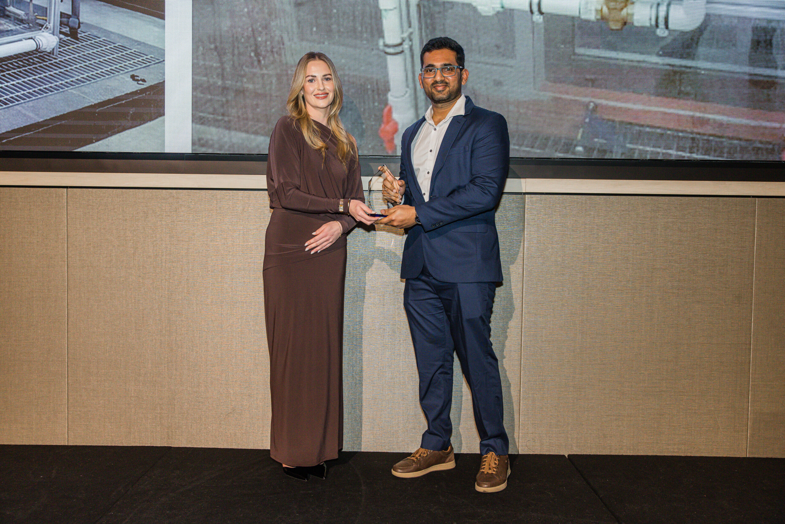 Aluflam Australia receiving the Most Innovative Product/Service Award at the 2026 AGWA Victoria Design Awards